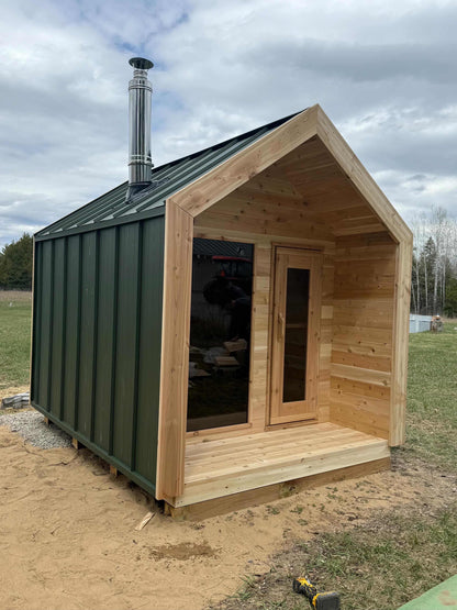 Modern Cabin Sauna with Steel Roof and Siding with 2 Front Windows
