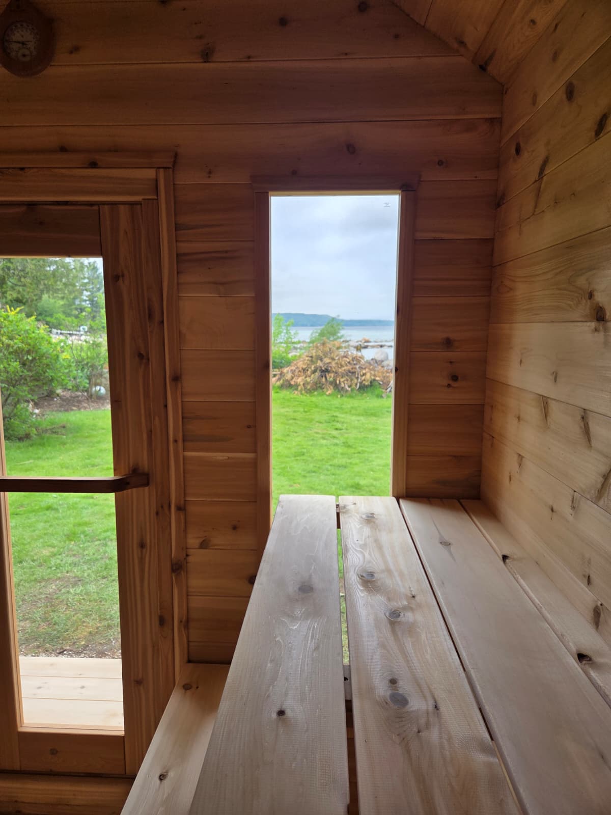 Modern Cabin Sauna with Steel Roof and Siding with 2 Front Windows