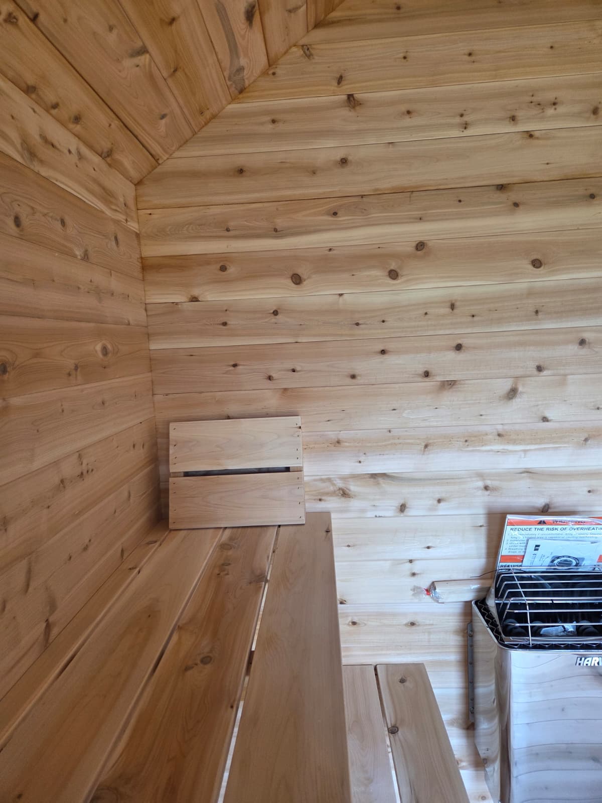 Modern Cabin Sauna with Steel Roof and Siding with 2 Front Windows