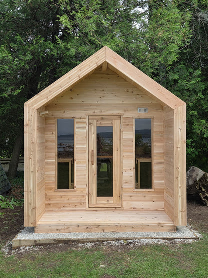 Modern Cabin Sauna with Steel Roof and Siding with 2 Front Windows