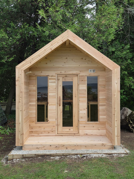 Modern Cabin Sauna with Steel Roof and Siding with 2 Front Windows