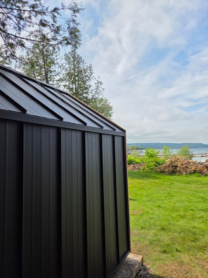 Modern Cabin Sauna with Steel Roof and Siding with 2 Front Windows