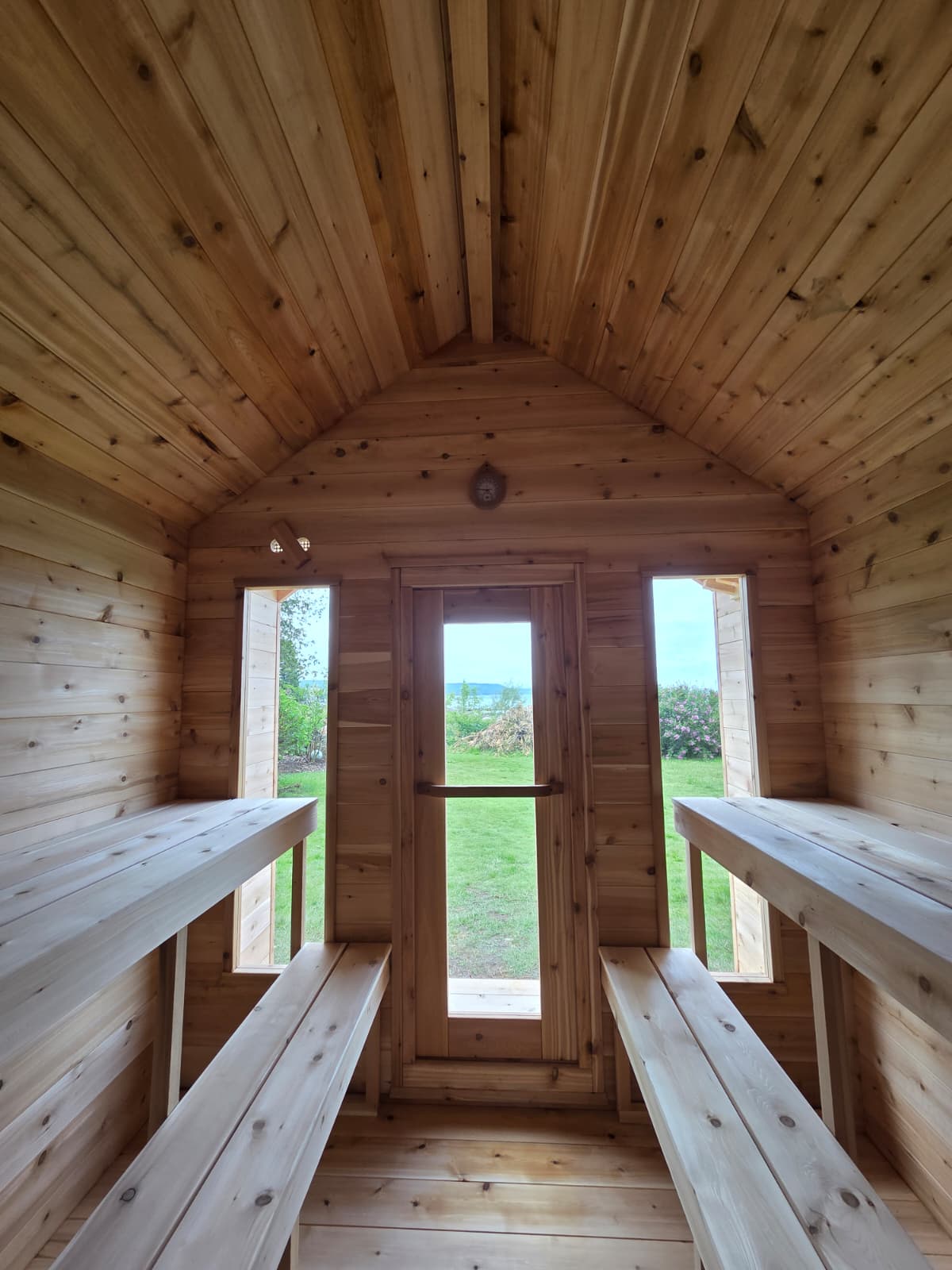 Modern Cabin Sauna with Steel Roof and Siding with 2 Front Windows