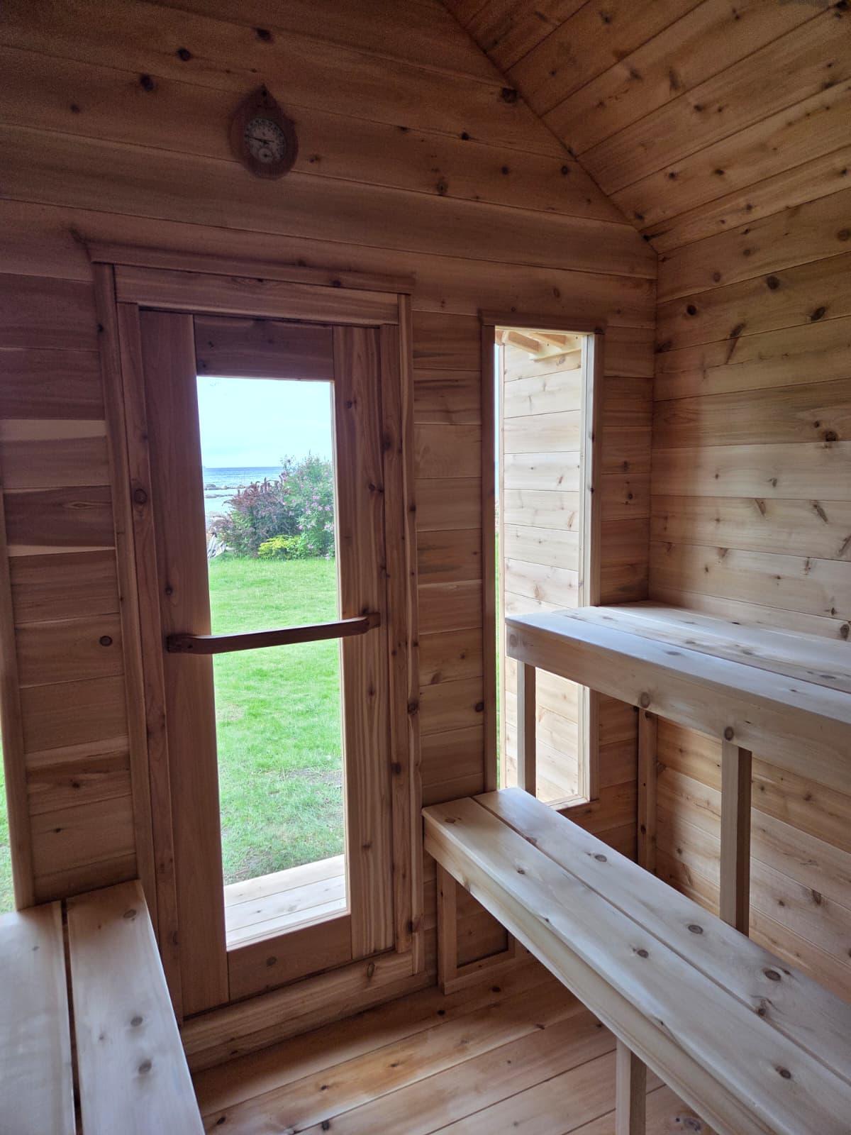 Modern Cabin Sauna with Steel Roof and Siding with 2 Front Windows