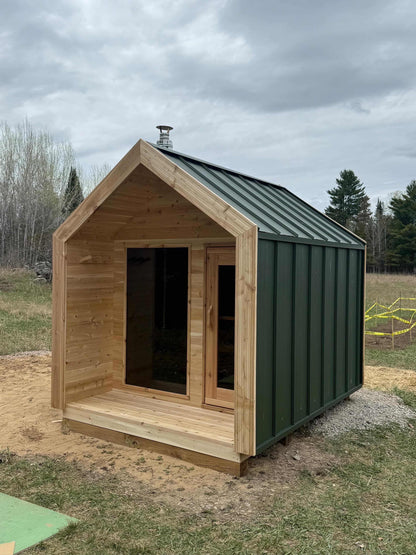Modern Cabin Sauna with Steel Roof and Siding with 2 Front Windows