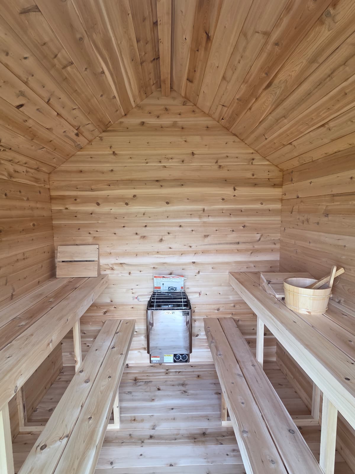 Modern Cabin Sauna with Steel Roof and Siding with 2 Front Windows