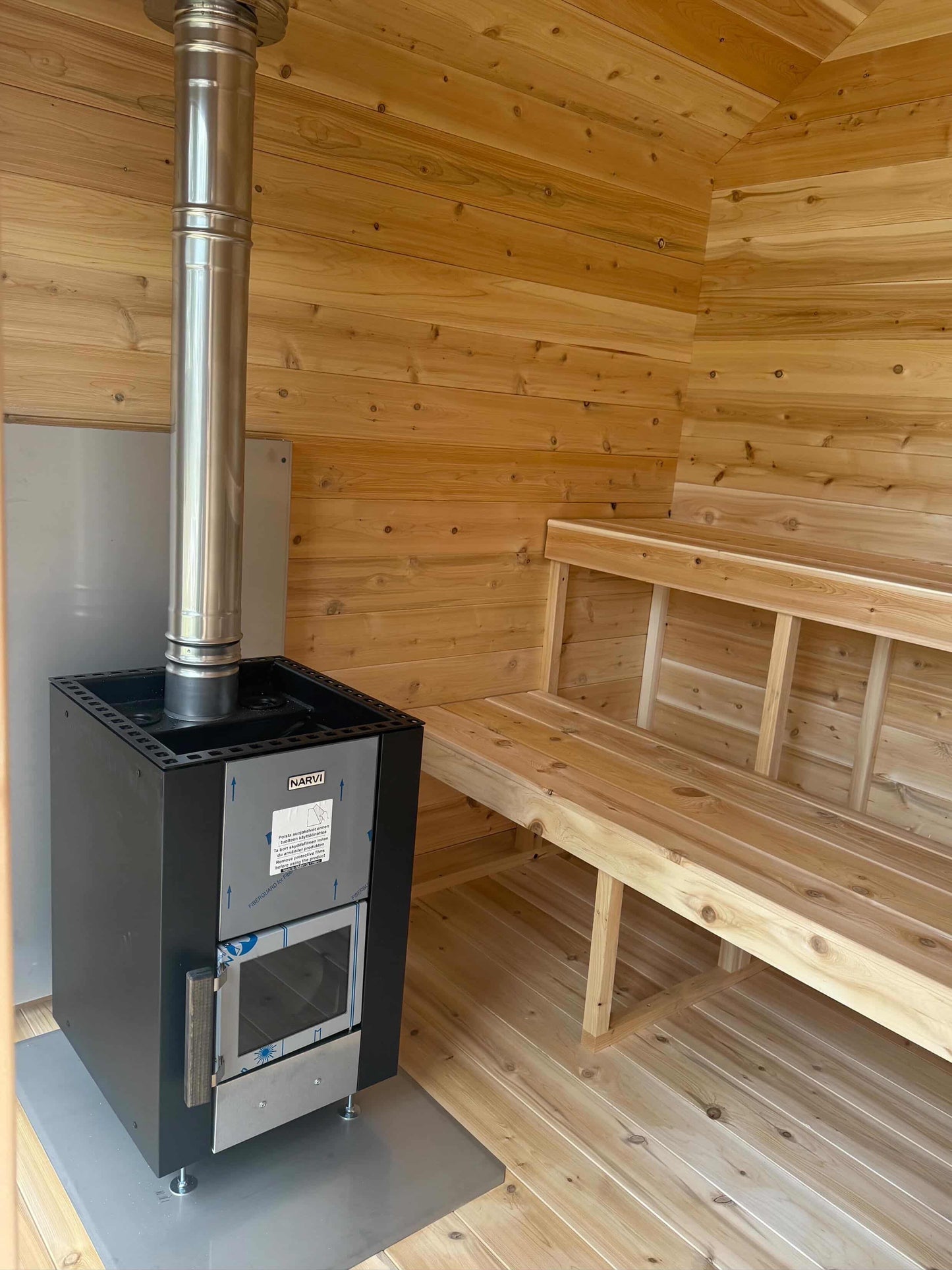 Modern Cabin Sauna with Steel Roof and Siding with 2 Front Windows