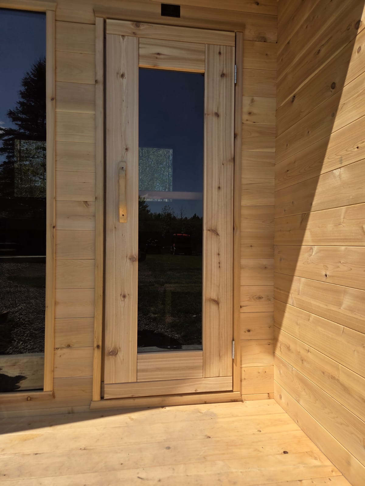 Modern Cabin Sauna Steel Roof and Siding with Large Front Window