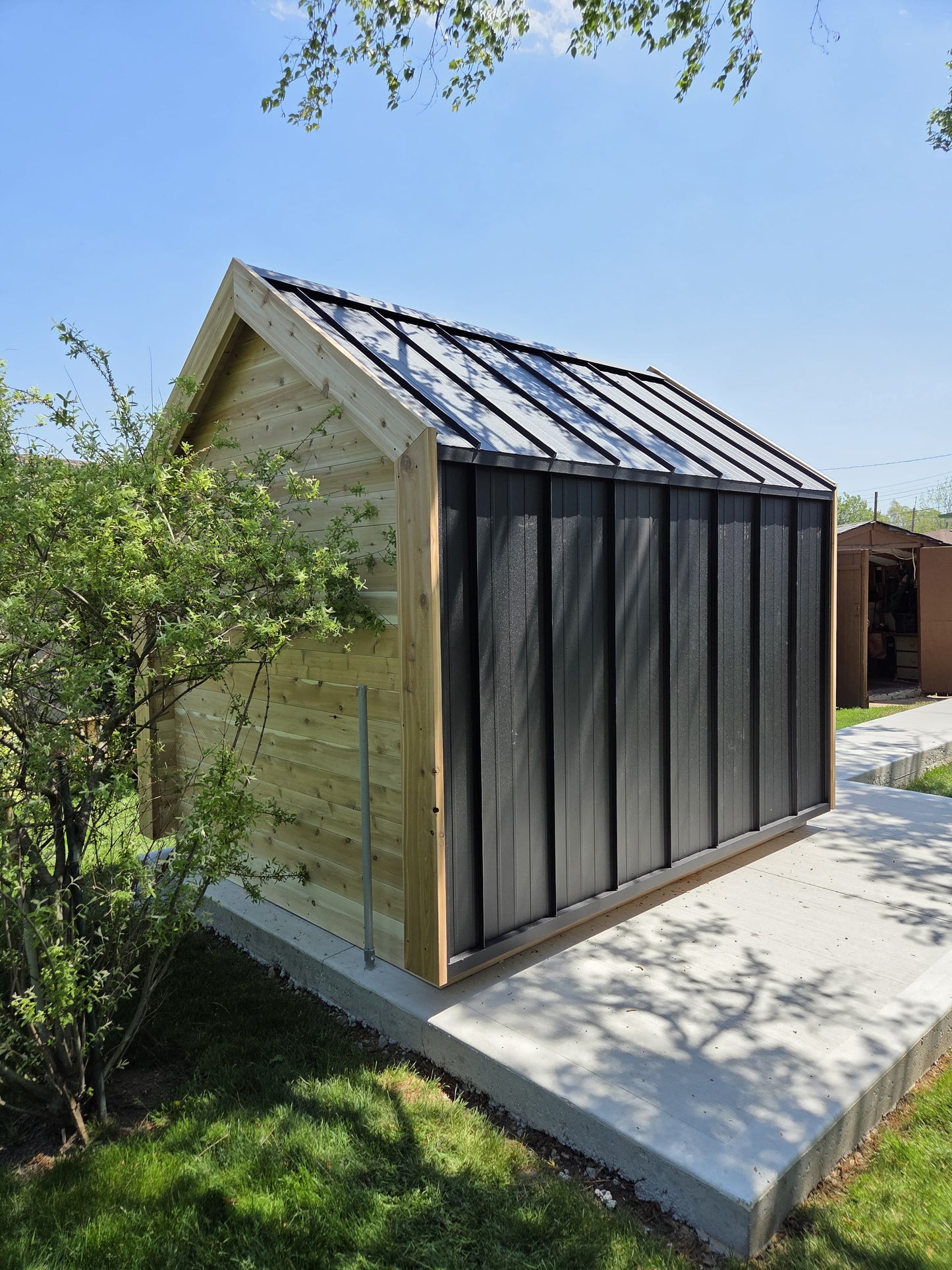 Modern Cabin Sauna Steel Roof and Siding with Large Front Window