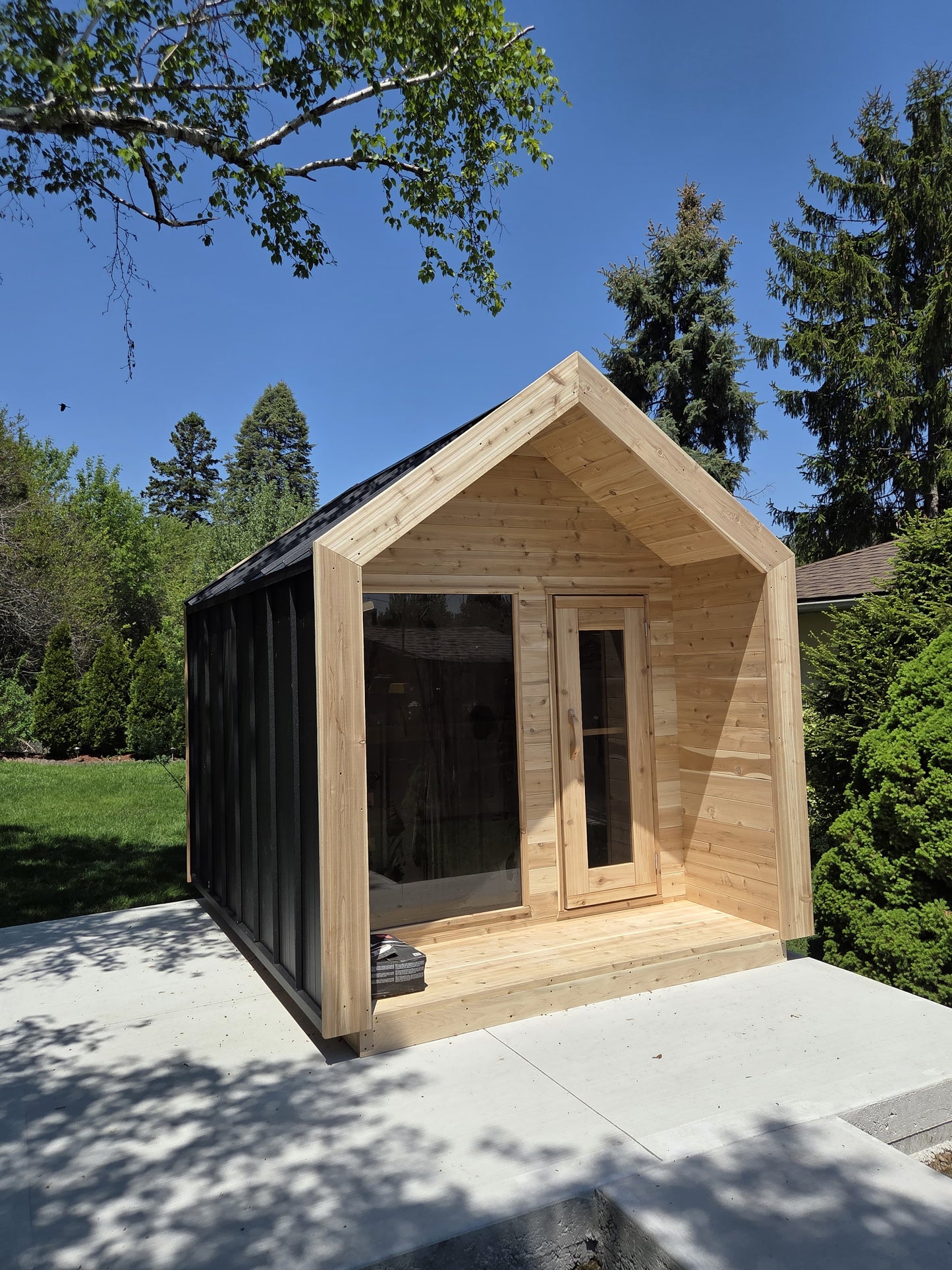 Modern Cabin Sauna Steel Roof and Siding with Large Front Window